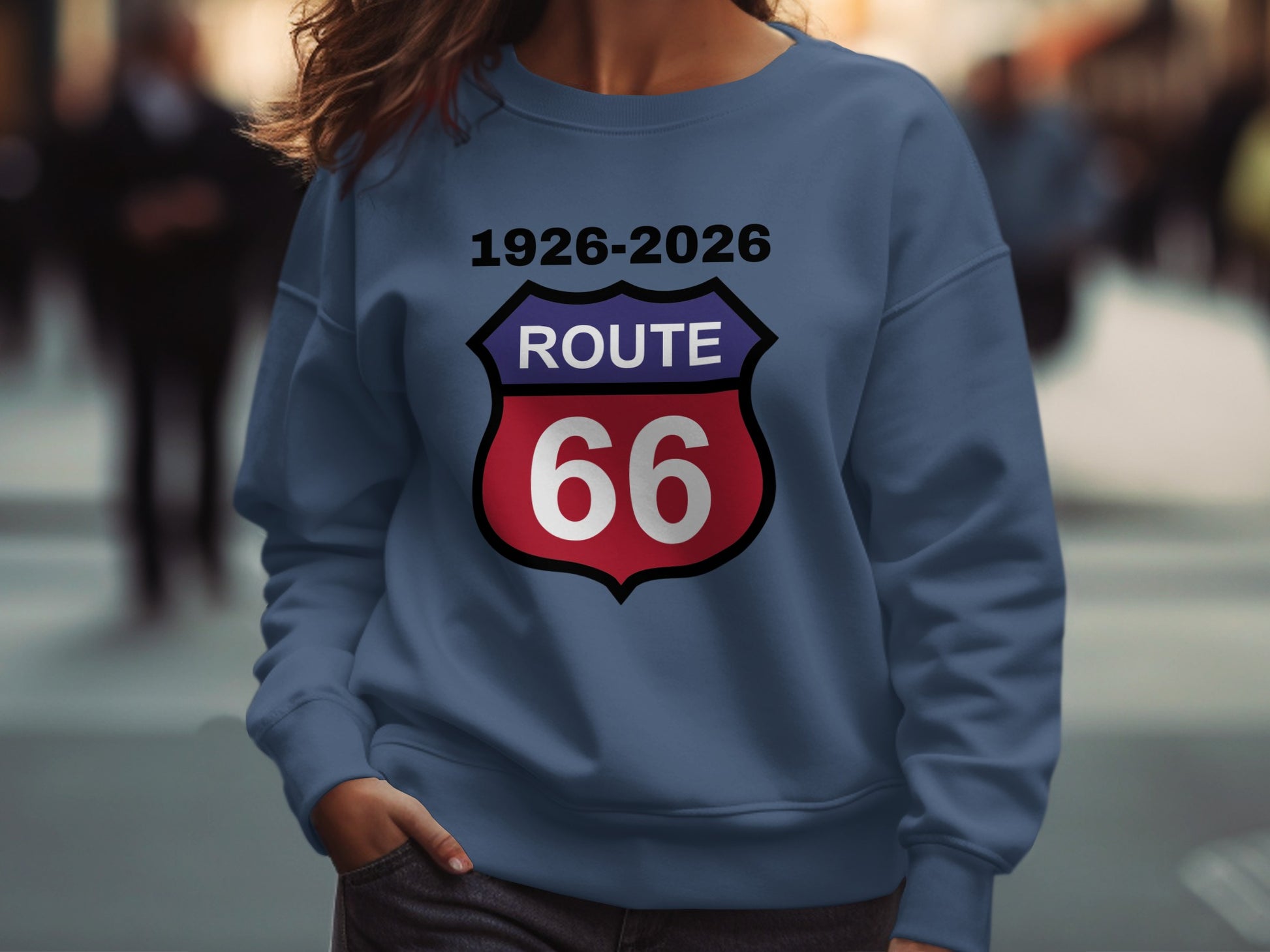 Blue sweatshirt with Route 66 logo and years 1926-2026.
