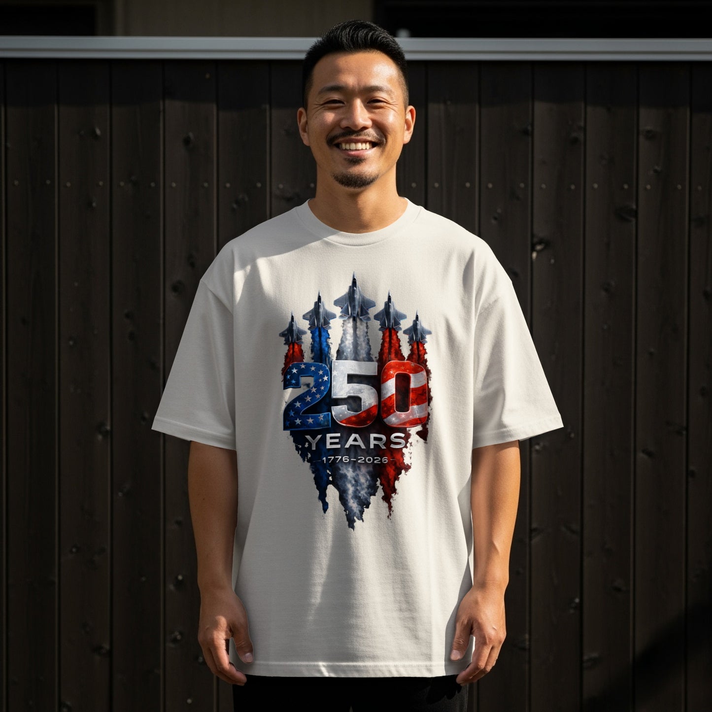 Man wearing white t-shirt with 250 Years 1776-2026 patriotic graphic.