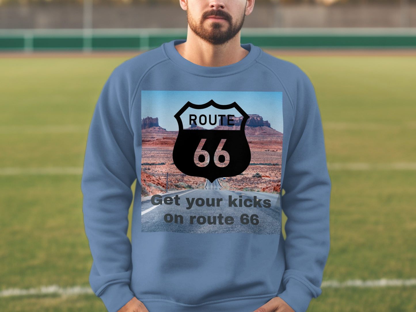 Blue sweatshirt with Route 66 logo and road graphic.