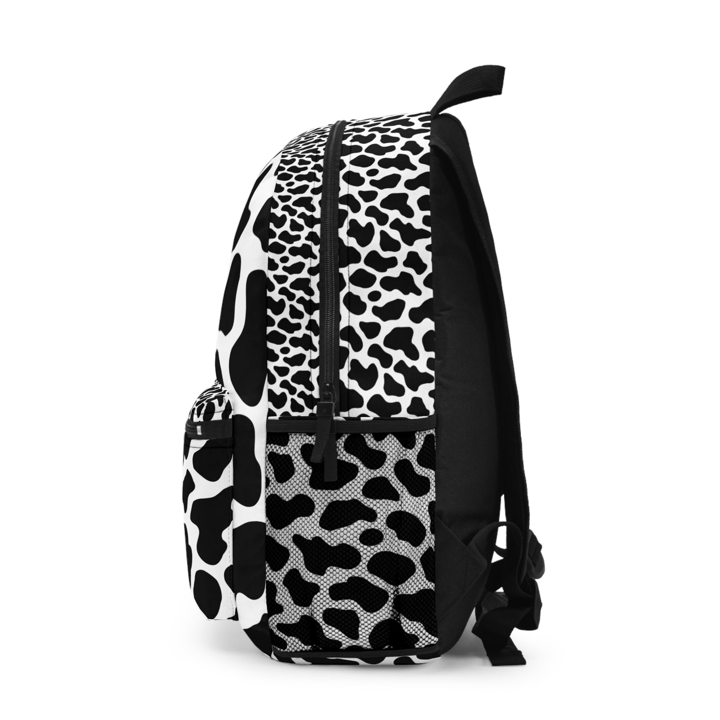 Black and white cow print backpack with black straps and mesh pockets.