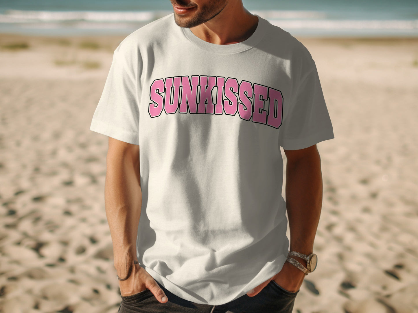 White t-shirt with "SUNKISSED" text in pink outlined letters.