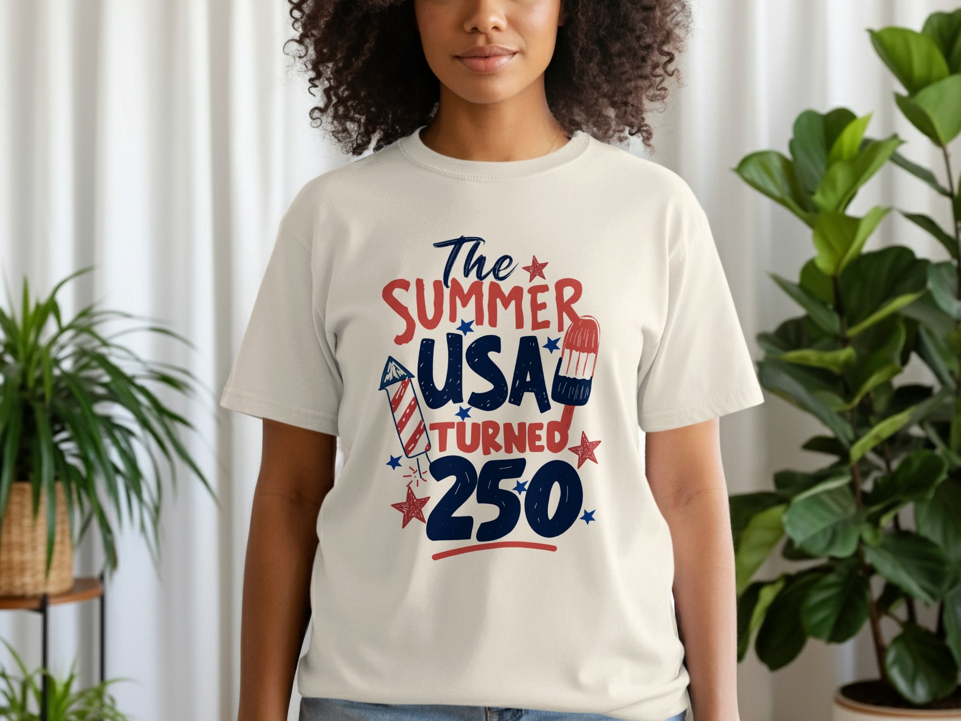 T-shirt with "The Summer Turned 250" text and patriotic graphics.
