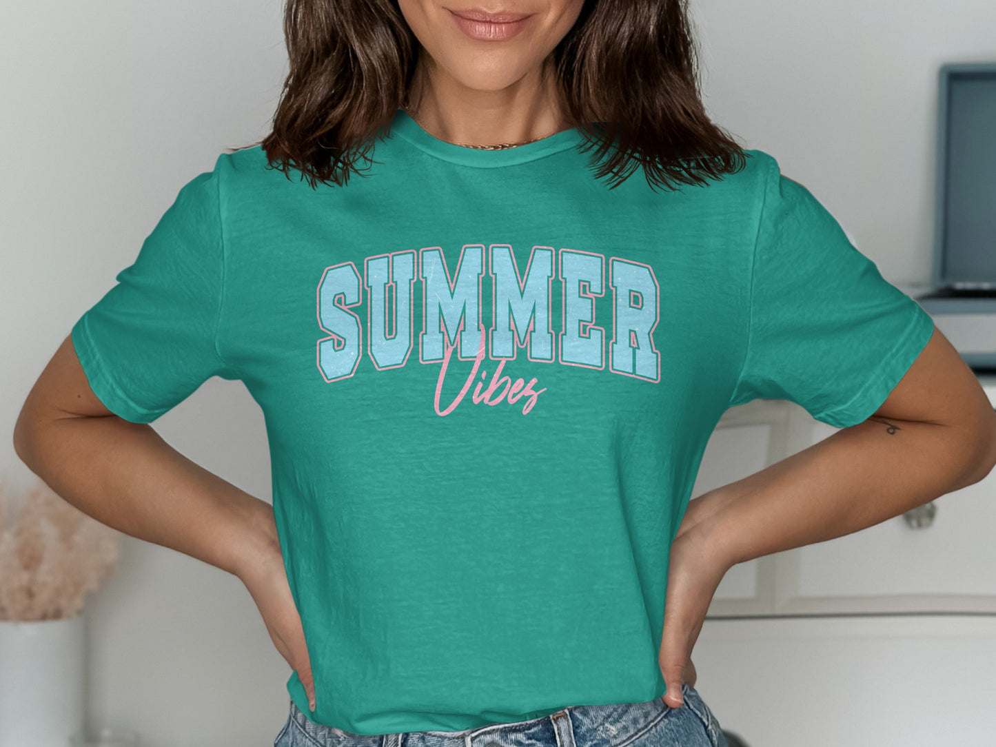 Teal t-shirt with "SUMMER VIBES" text.