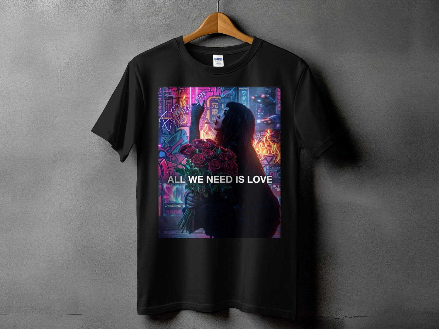 Black t-shirt with a woman holding roses, neon signs, and the text "ALL WE NEED IS LOVE".