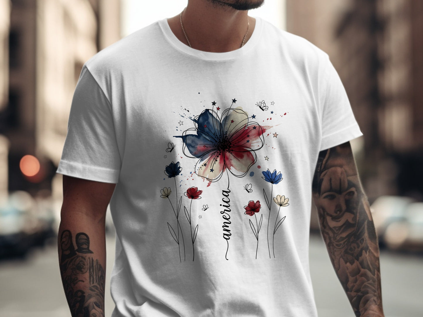 White t-shirt with red, white, and blue flower and "America" text.