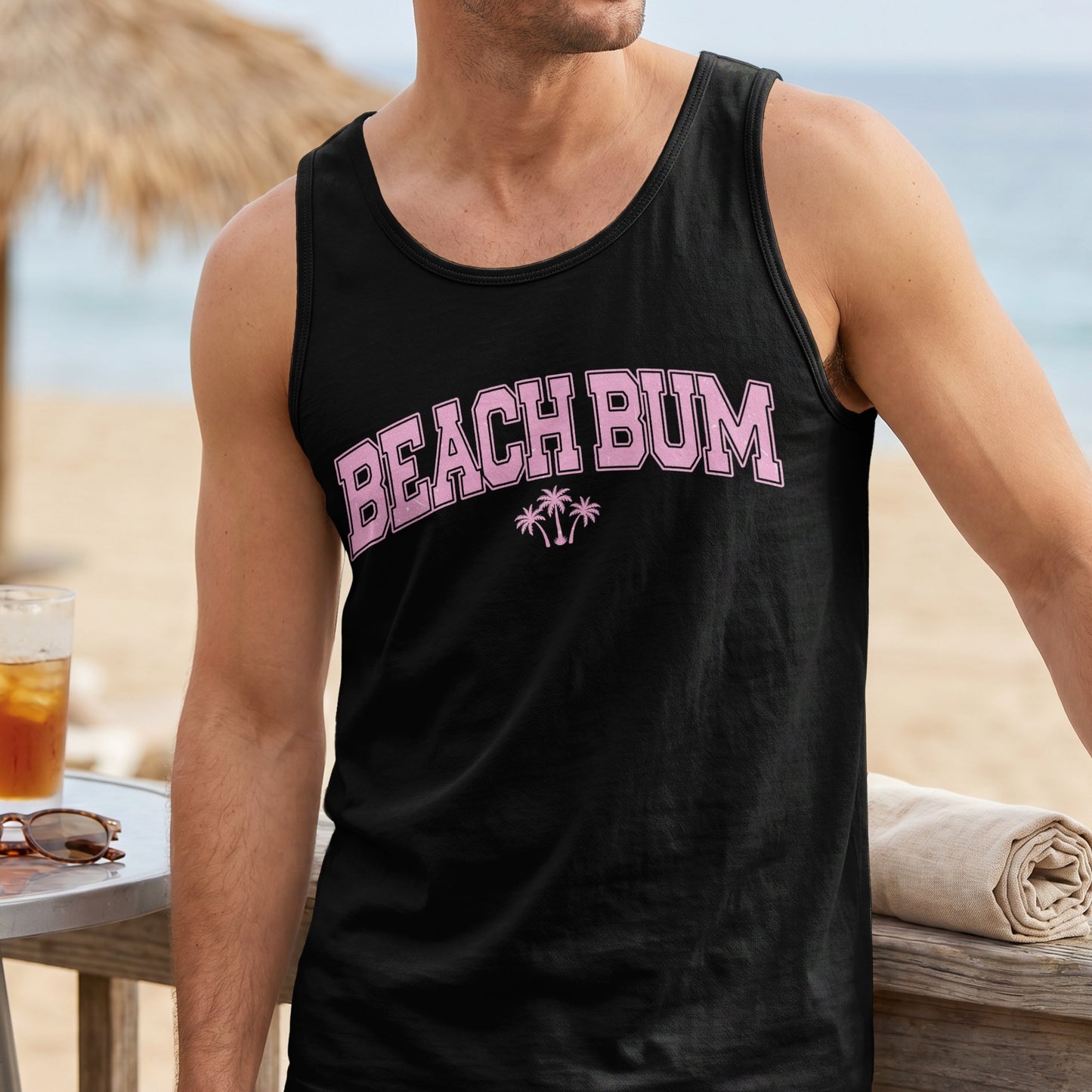 Black tank top with "BEACH BUM" in pink lettering.