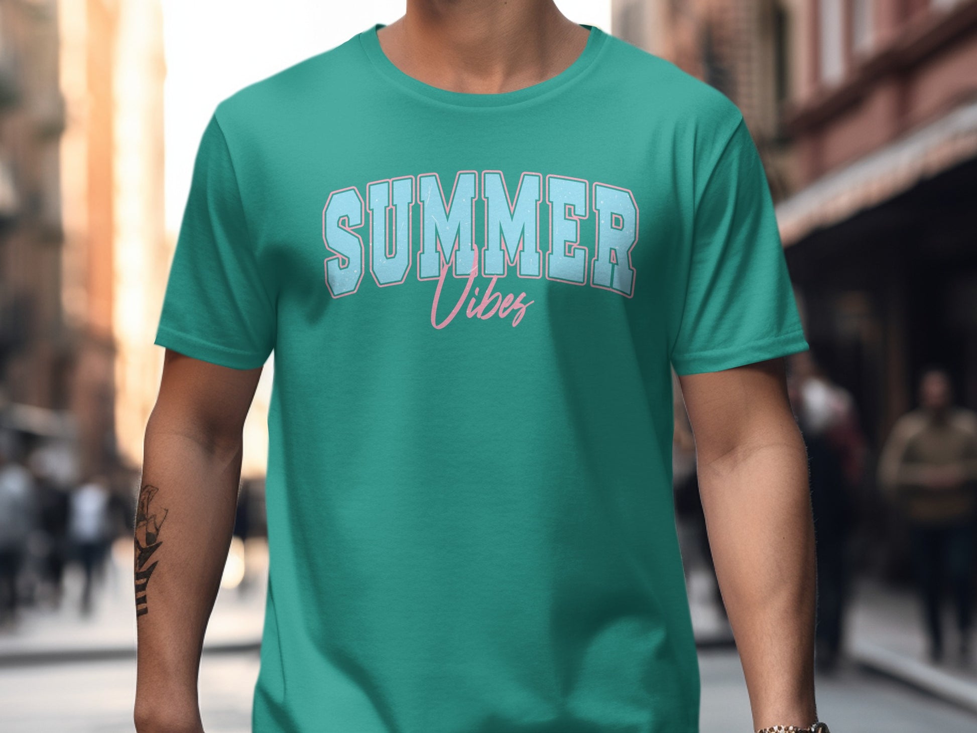 Teal t-shirt with "Summer Vibes" text in light blue and pink.