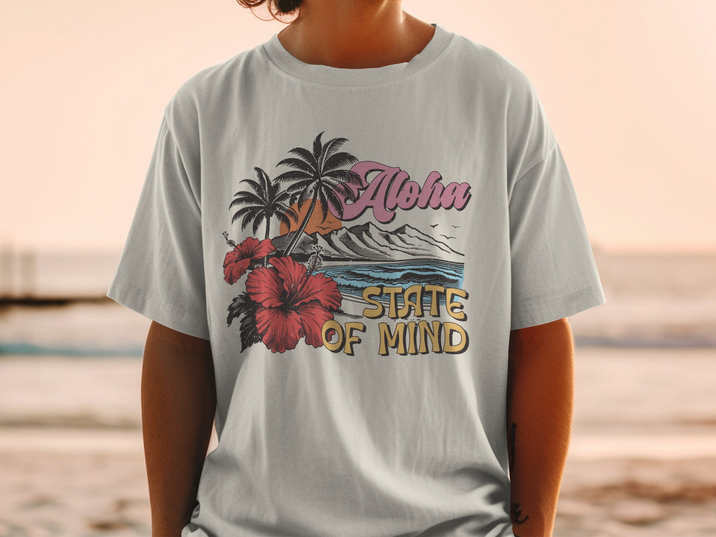 Gray t-shirt with "Aloha STATE OF MIND" text and tropical scene.