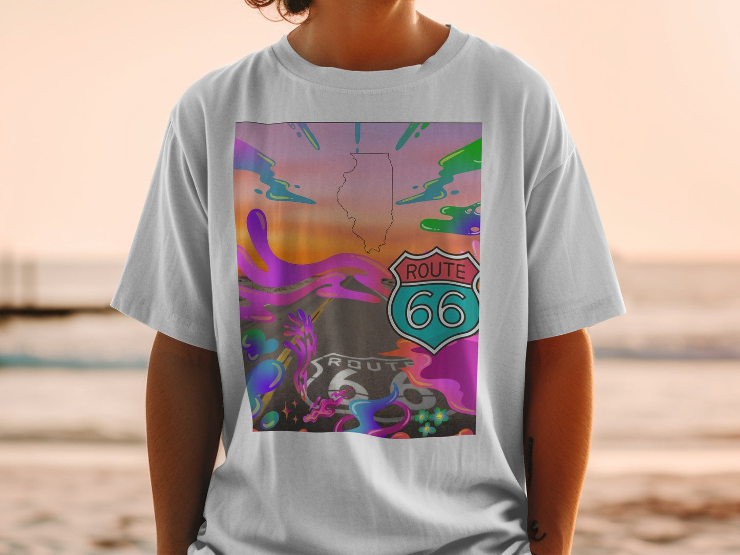 T-shirt with Route 66 Illinois graphic on a person by the ocean.