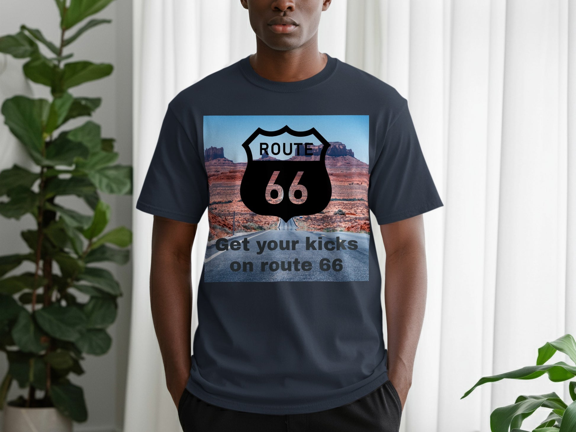 Dark blue t-shirt with Route 66 logo and desert landscape graphic.
