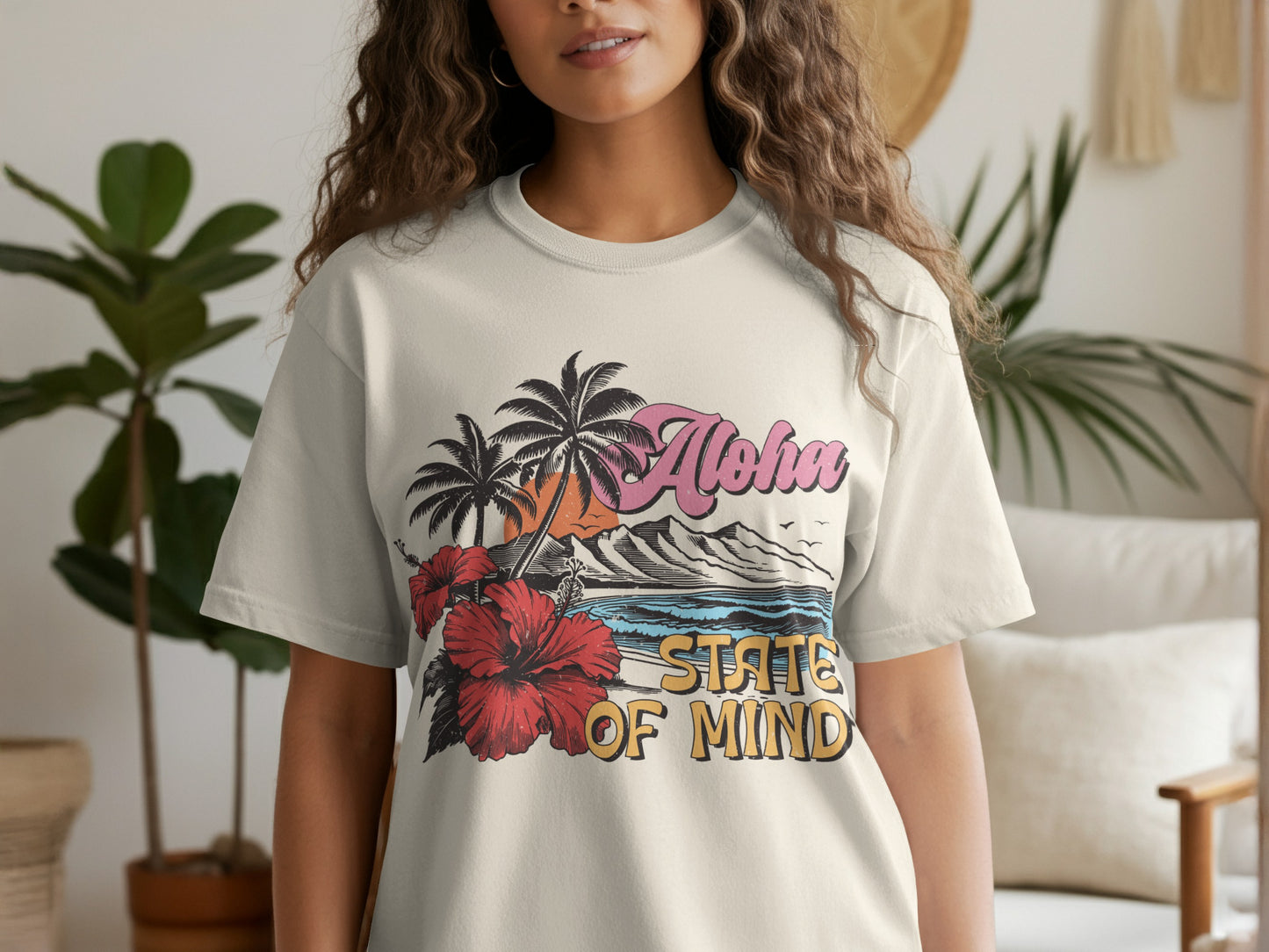 Cream t-shirt with "Aloha State of Mind" text and tropical beach scene.
