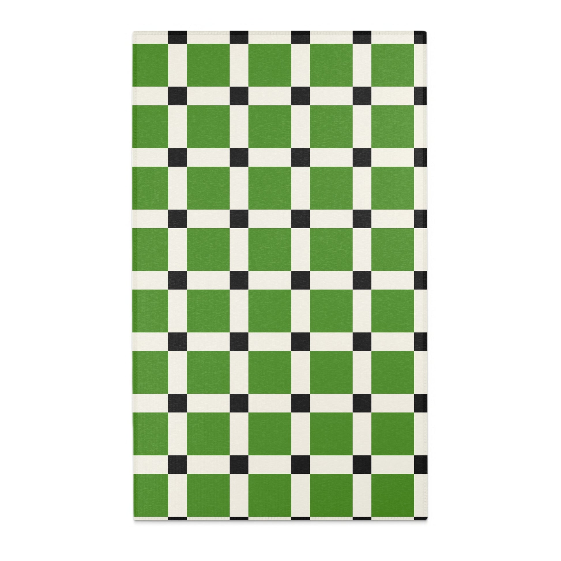 Green, white, and black checkered pattern on a rectangular mat.