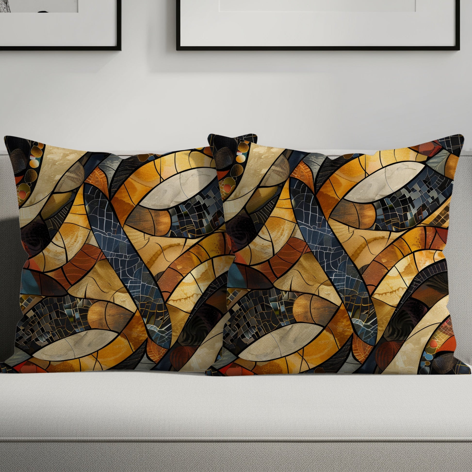 Two lumbar pillows with abstract stained-glass pattern in warm tones.