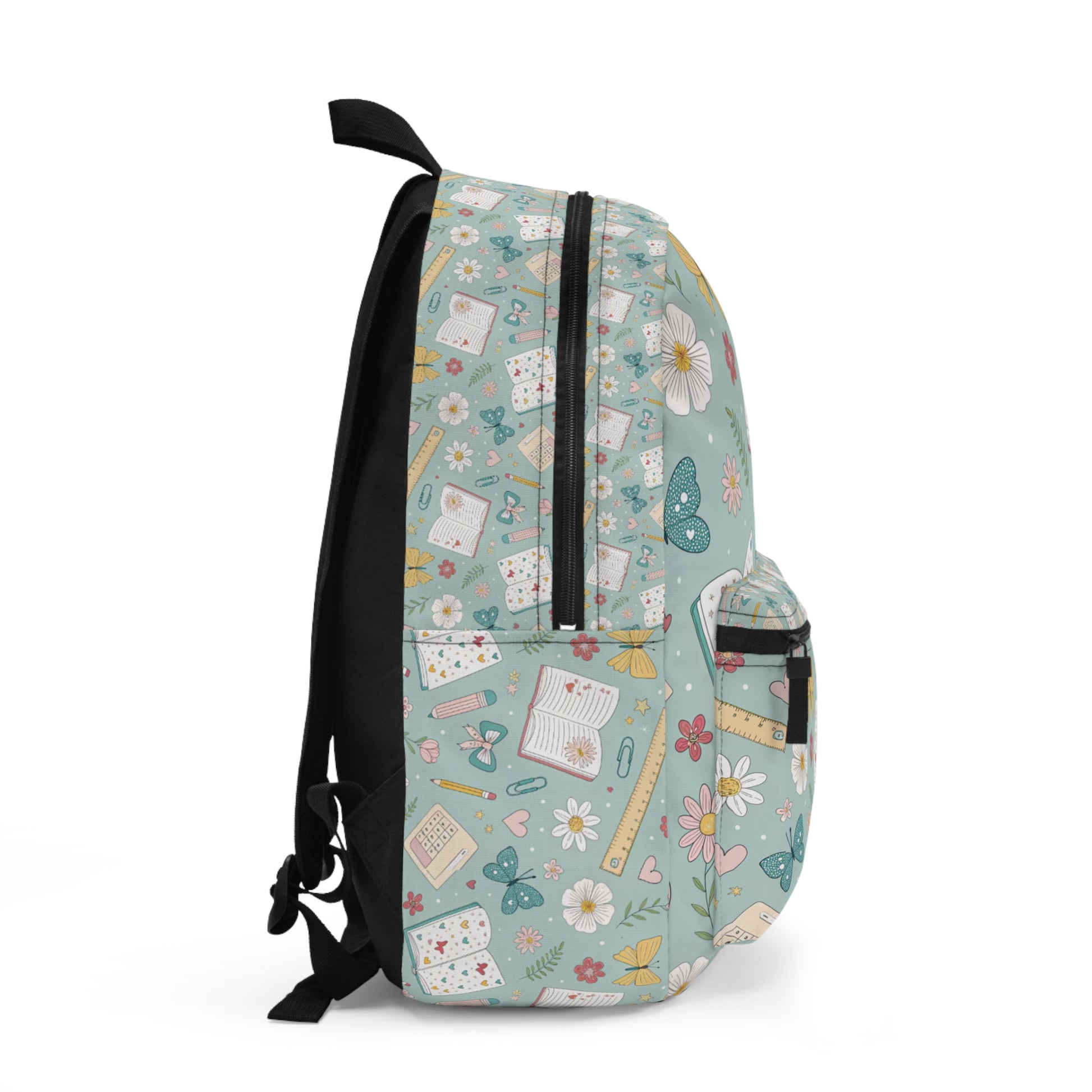 Backpack with a pastel blue background and a school-themed pattern.
