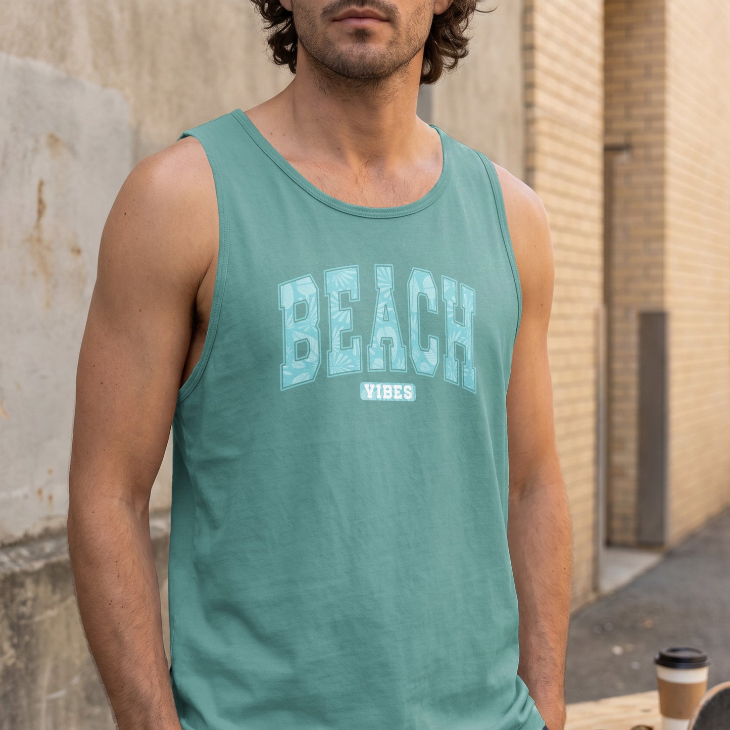 Teal tank top with "BEACH VIBES" text and tropical leaf pattern.