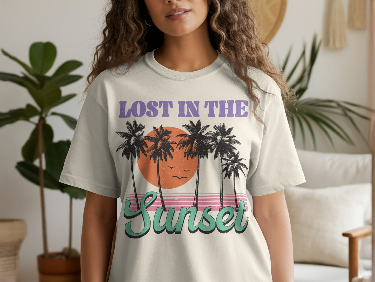 Cream t-shirt with "Lost in the Sunset" text and palm trees.