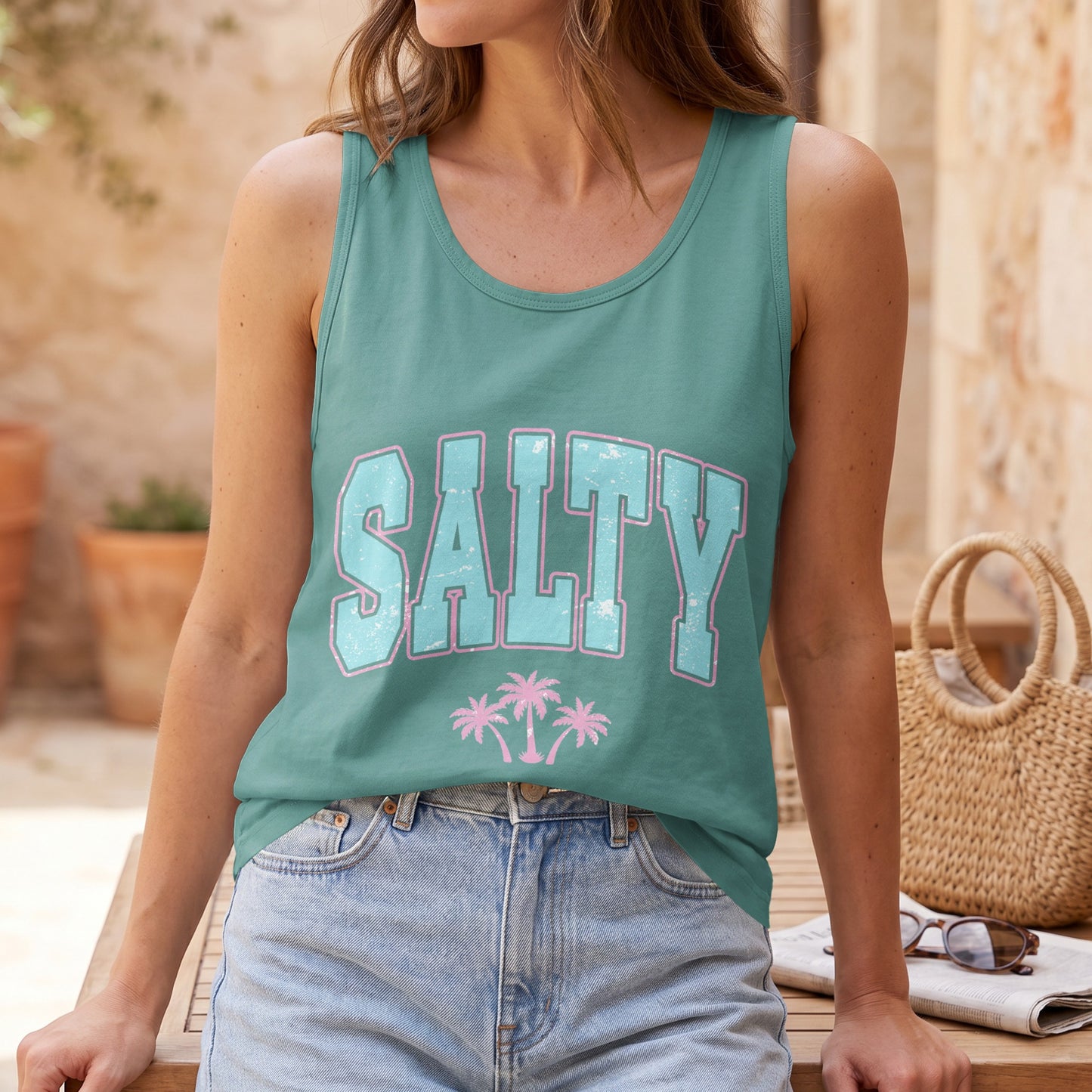 Teal tank top with "SALTY" text and pink palm trees.