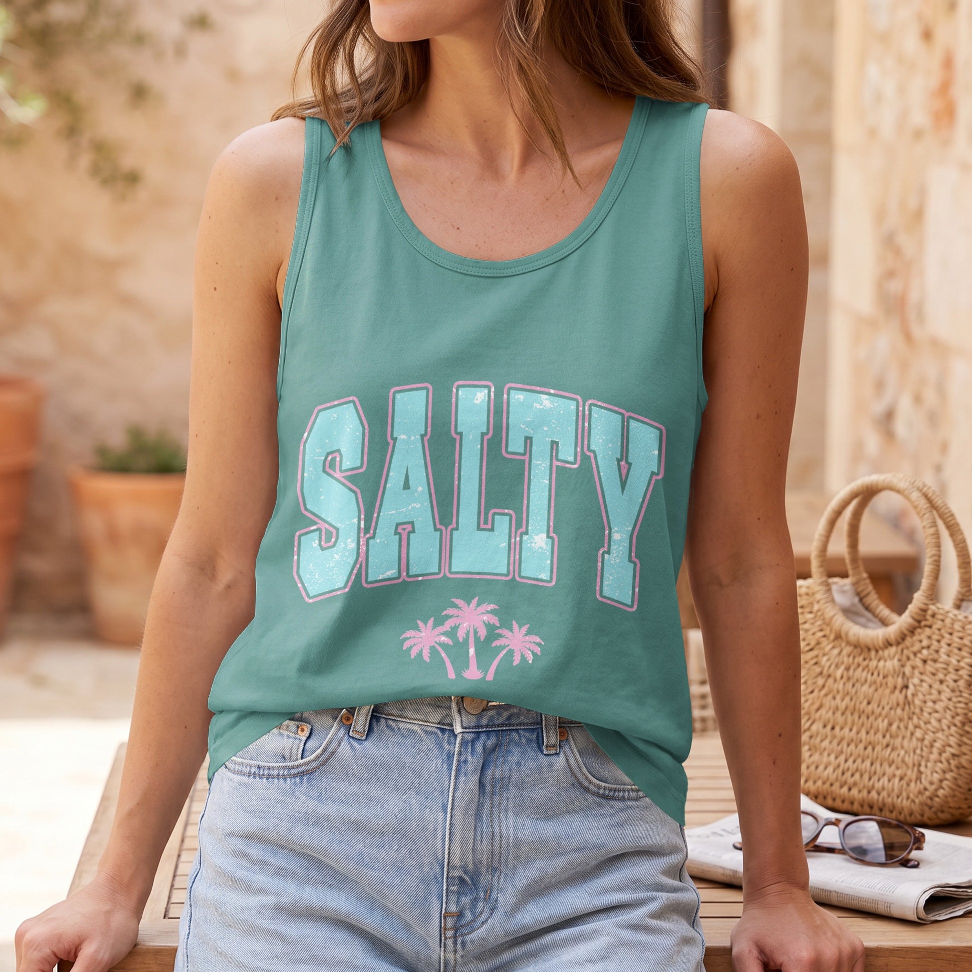 Teal tank top with "SALTY" text and pink palm trees.