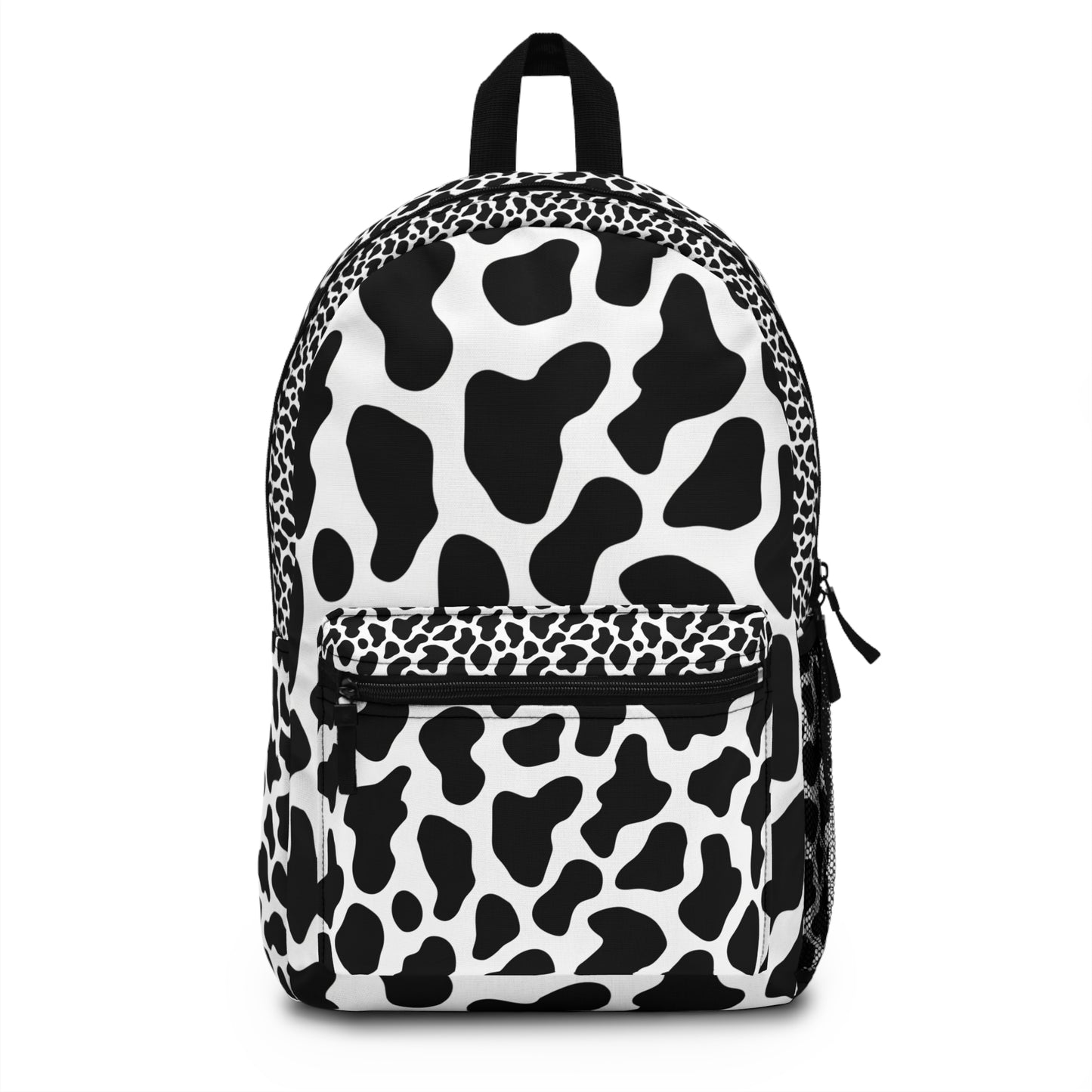 Black and white cow print backpack with black trim and zippered pockets.