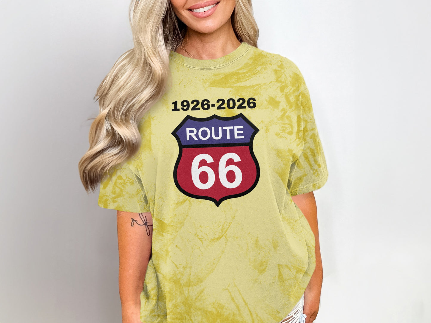 Yellow tie-dye t-shirt with Route 66 logo and dates 1926-2026.