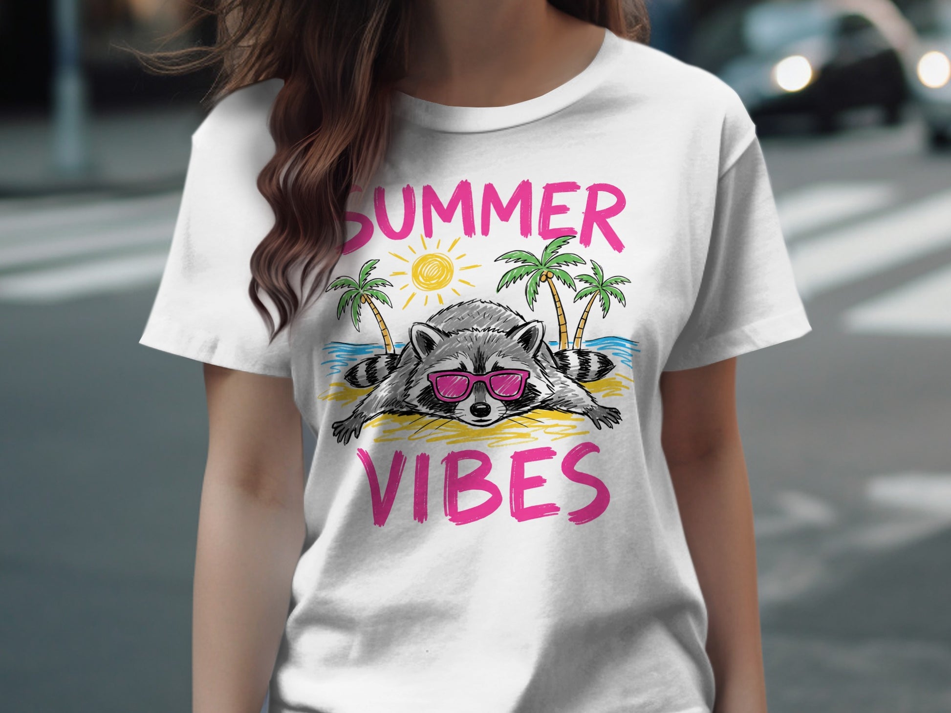 White t-shirt with "Summer Vibes" text and a relaxed raccoon on a beach.