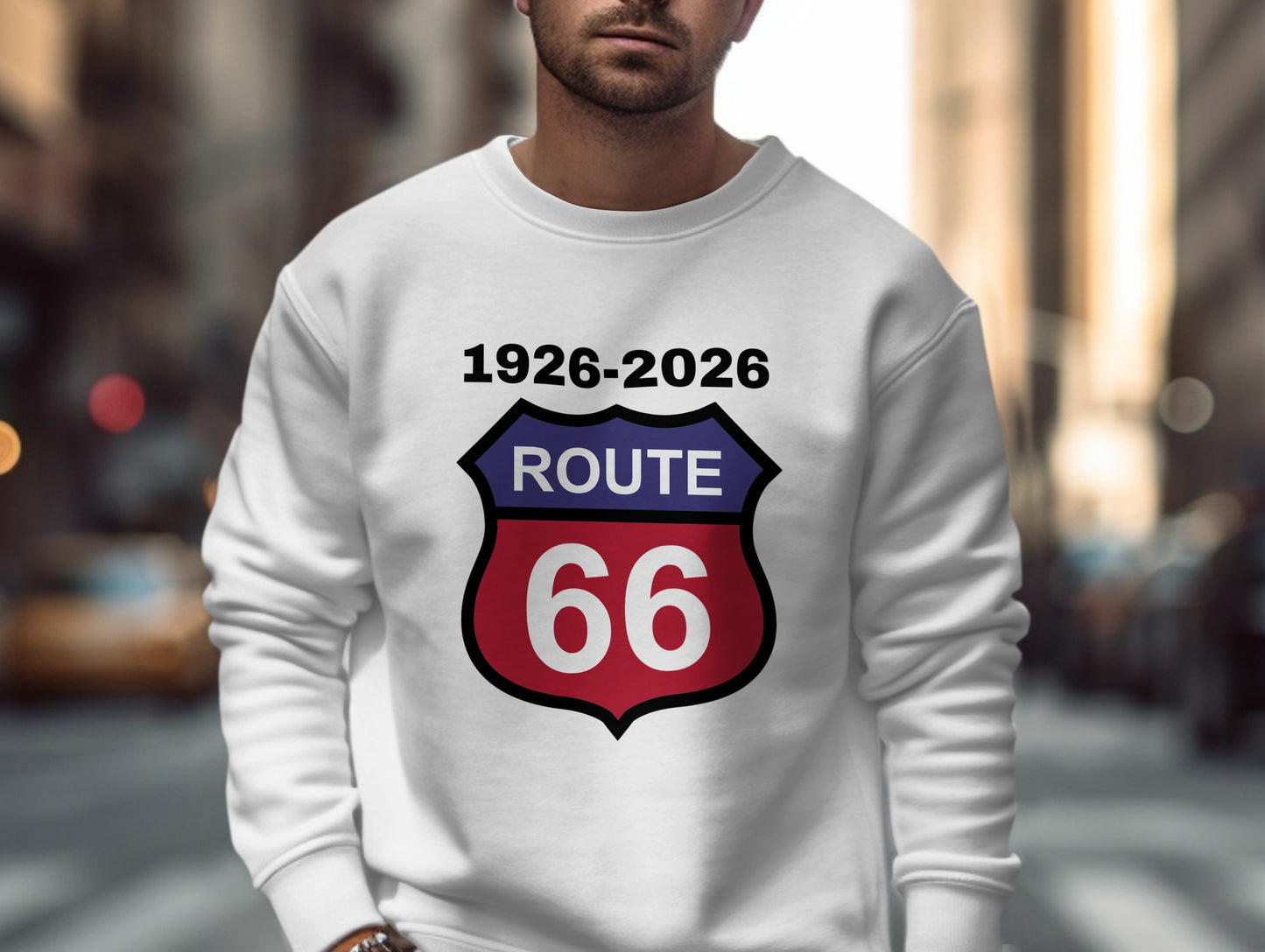 White sweatshirt with Route 66 shield logo and "1926-2026" text.