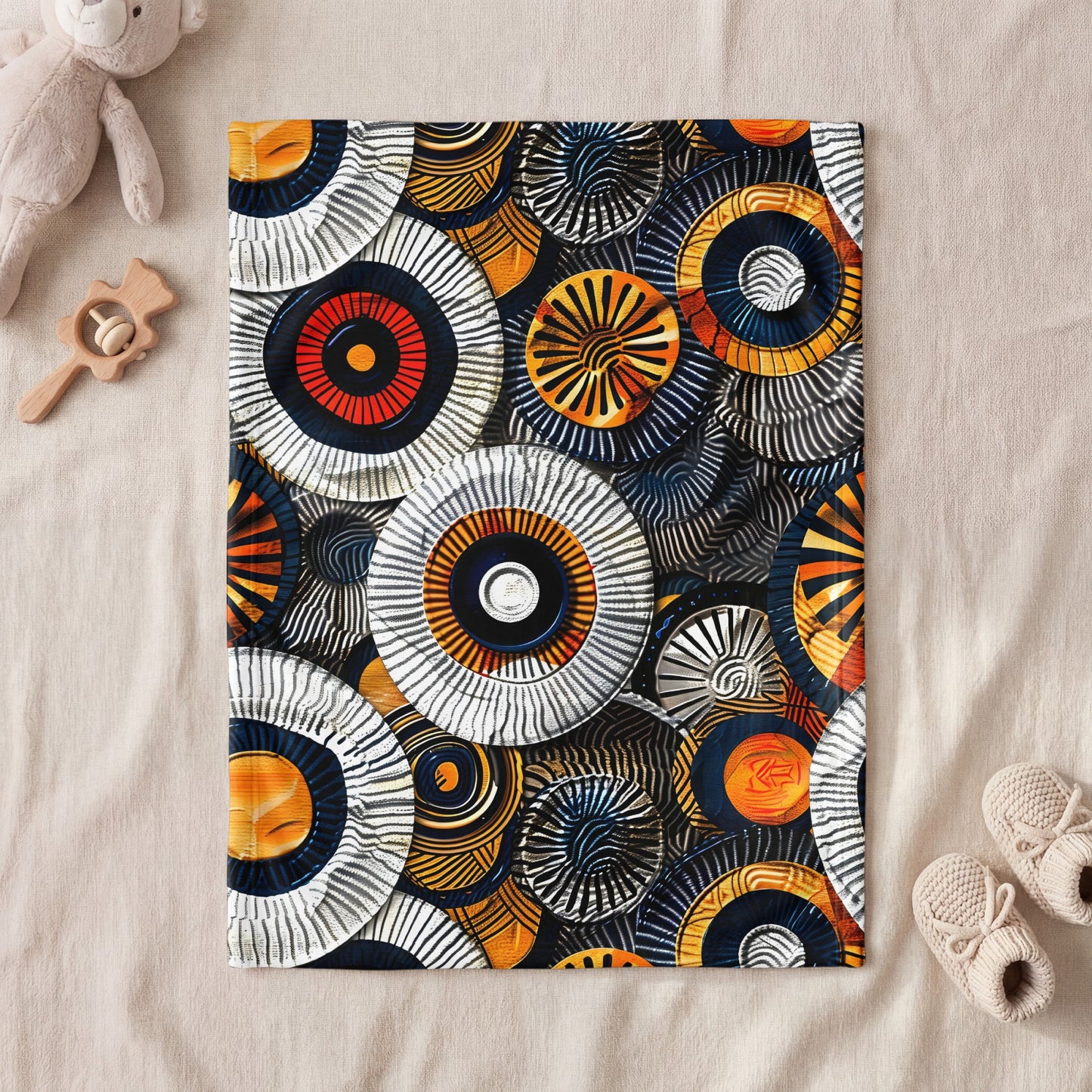 Abstract circular pattern with black, white, orange, yellow, and blue elements.