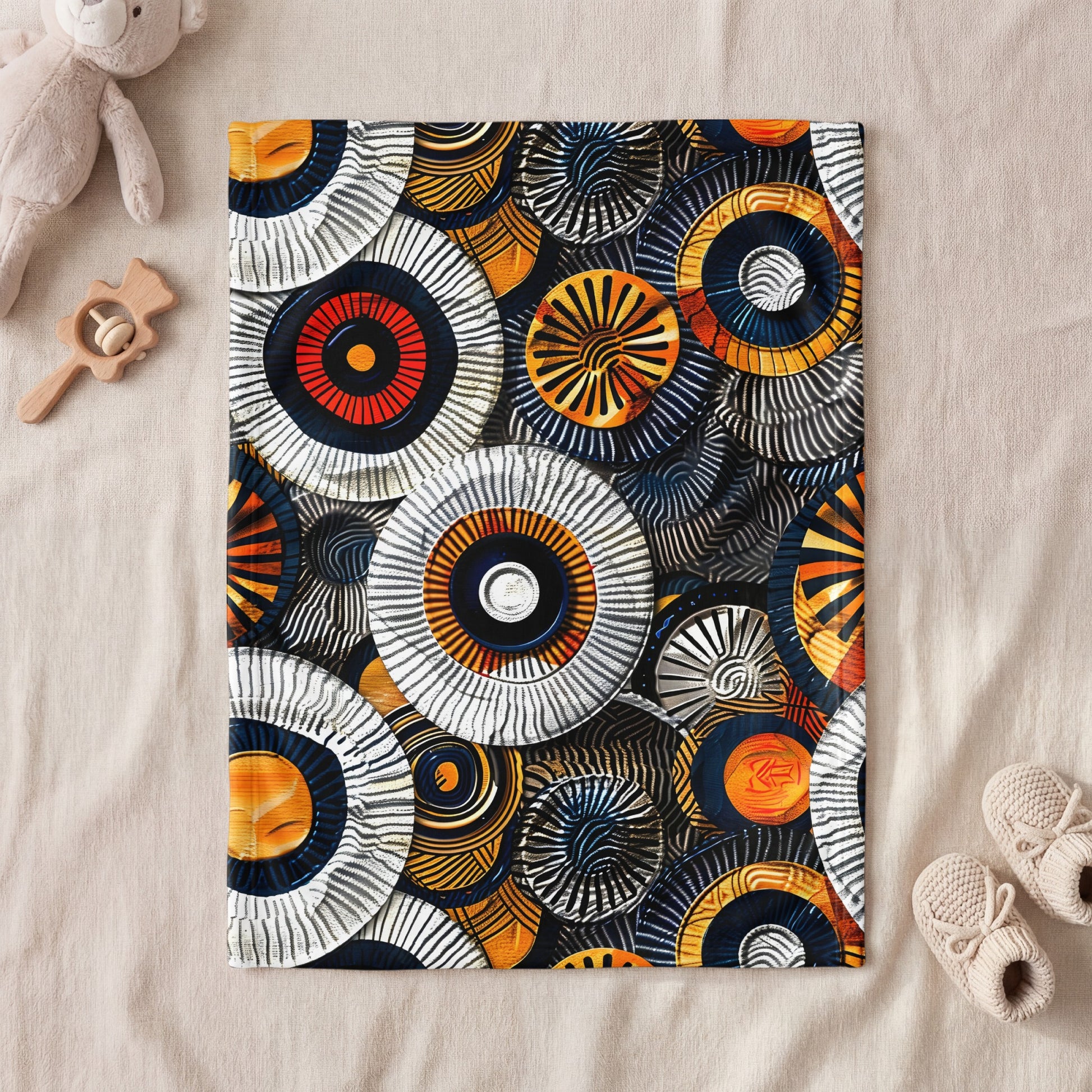 Abstract circular pattern with black, white, orange, yellow, and blue elements.