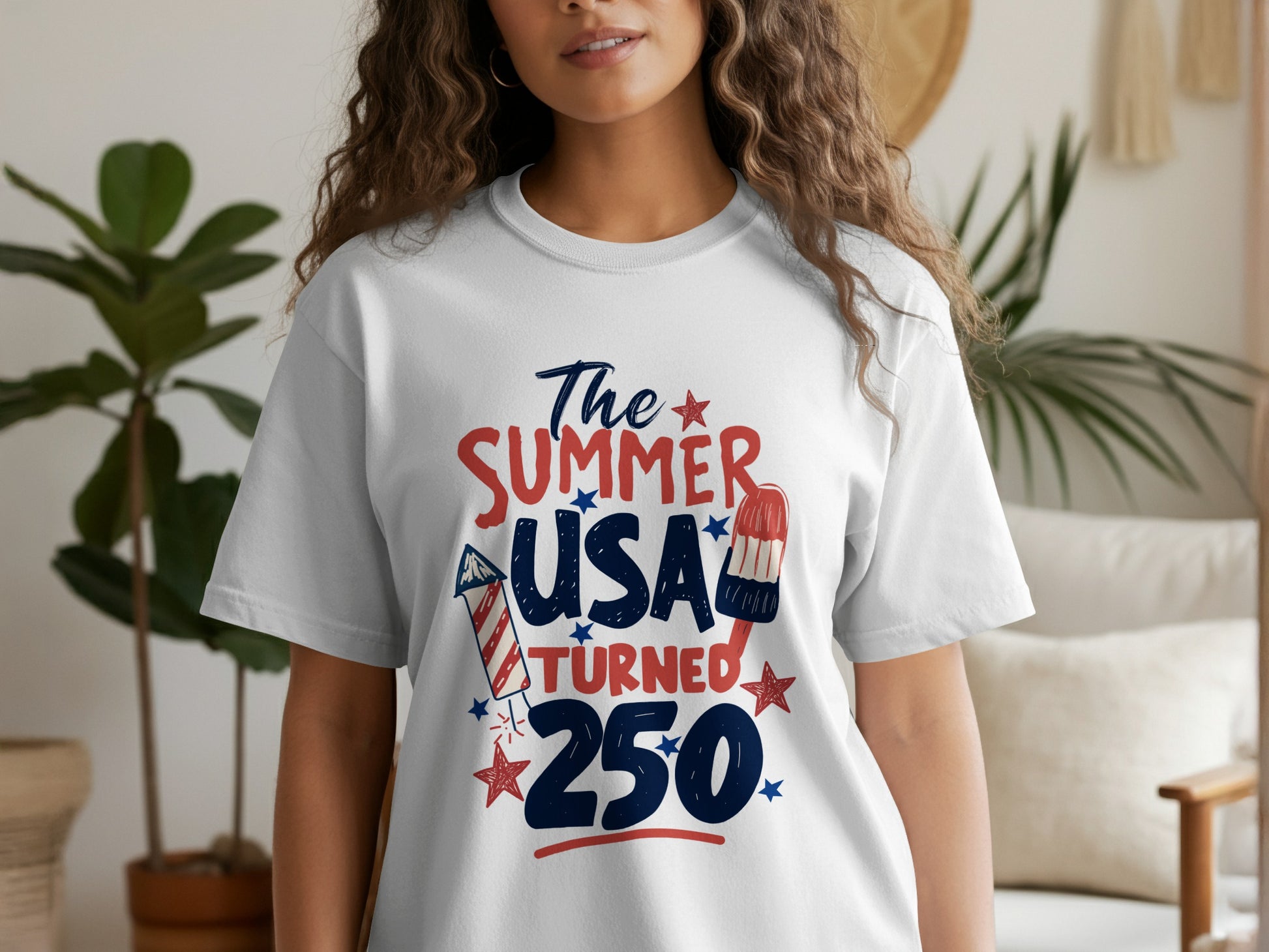 T-shirt with "The Summer USA Turned 250" text and fireworks.