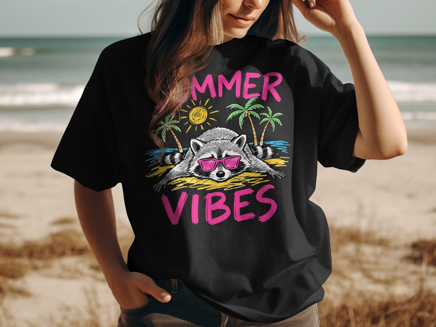 Black t-shirt with cartoon raccoon wearing sunglasses and text "SUMMER VIBES".