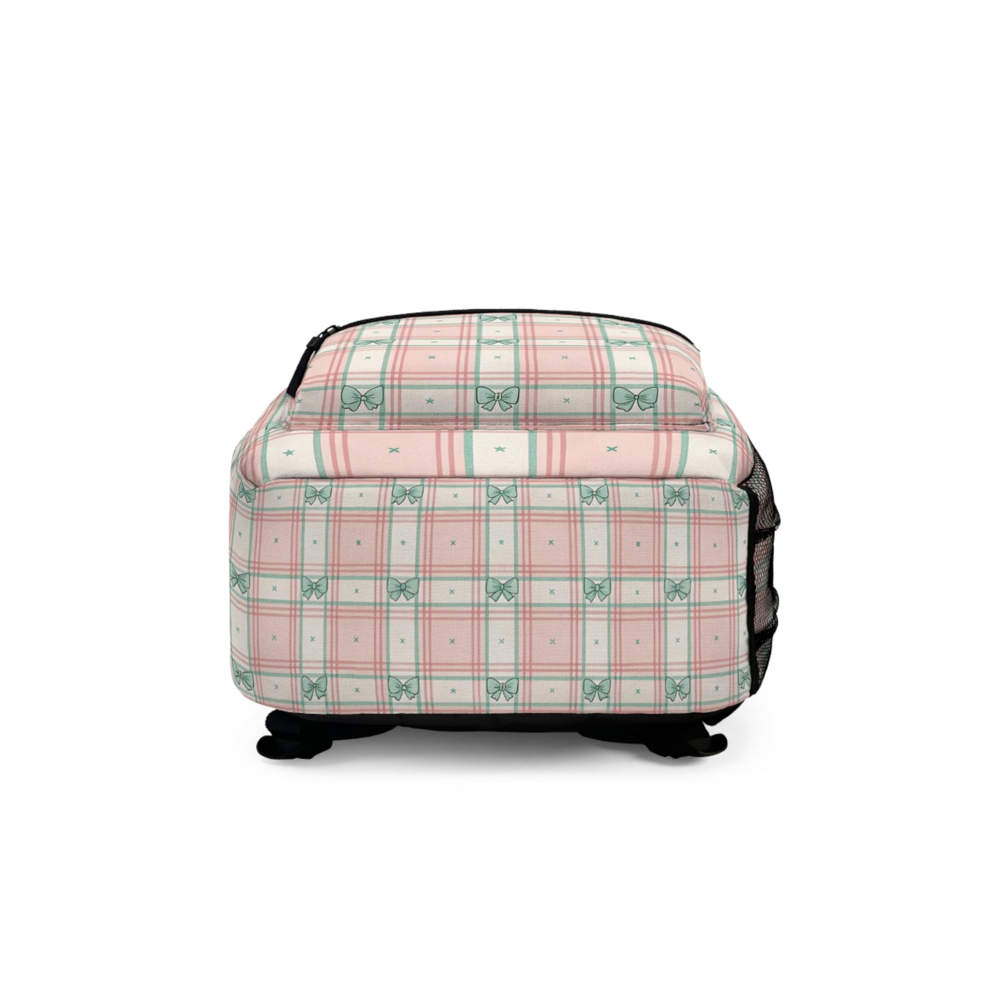 Backpack with pink and green plaid pattern featuring bows and stars.