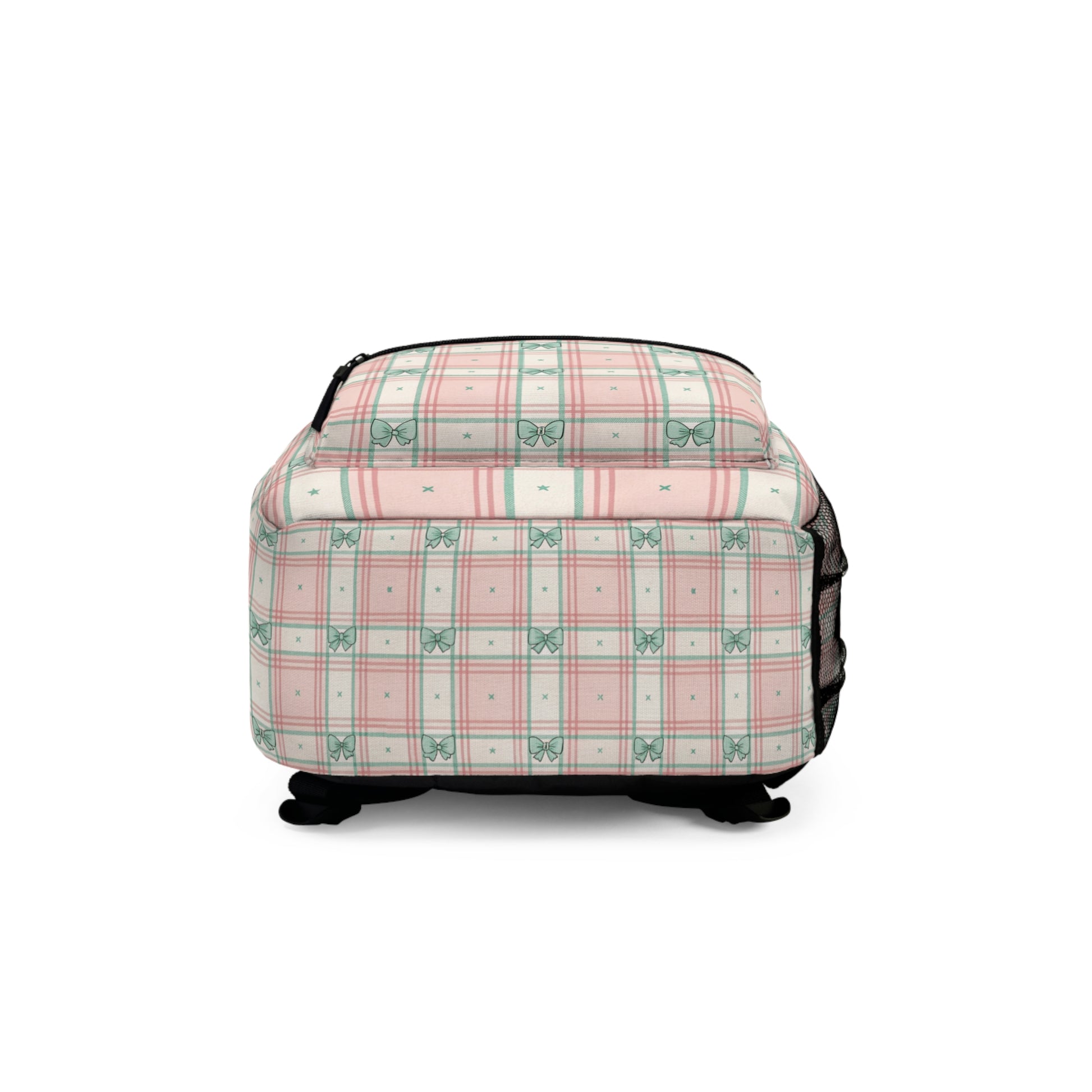 Backpack with pink and green plaid pattern featuring bows and stars.