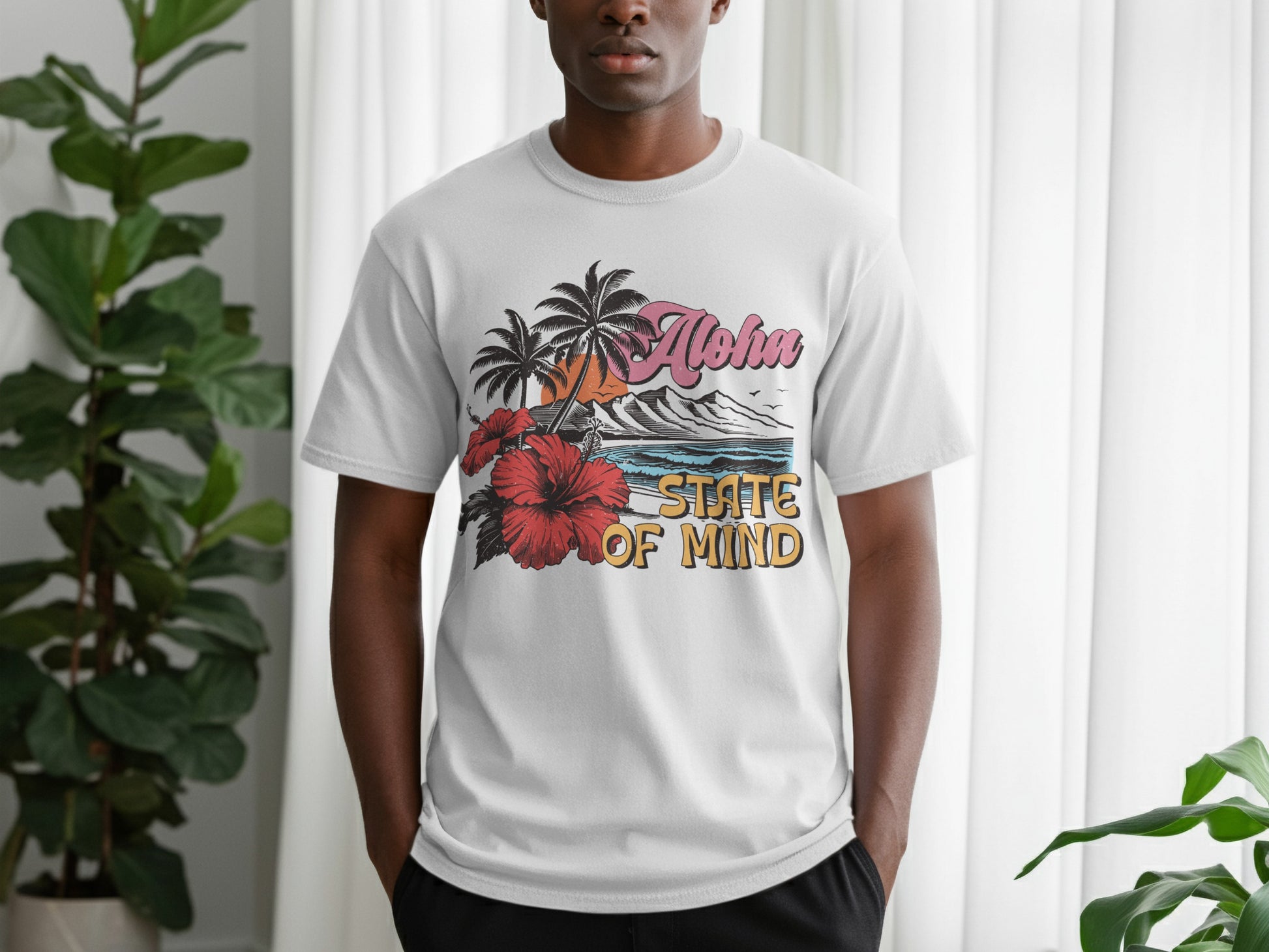 White t-shirt with "Aloha State of Mind" text and tropical graphic.