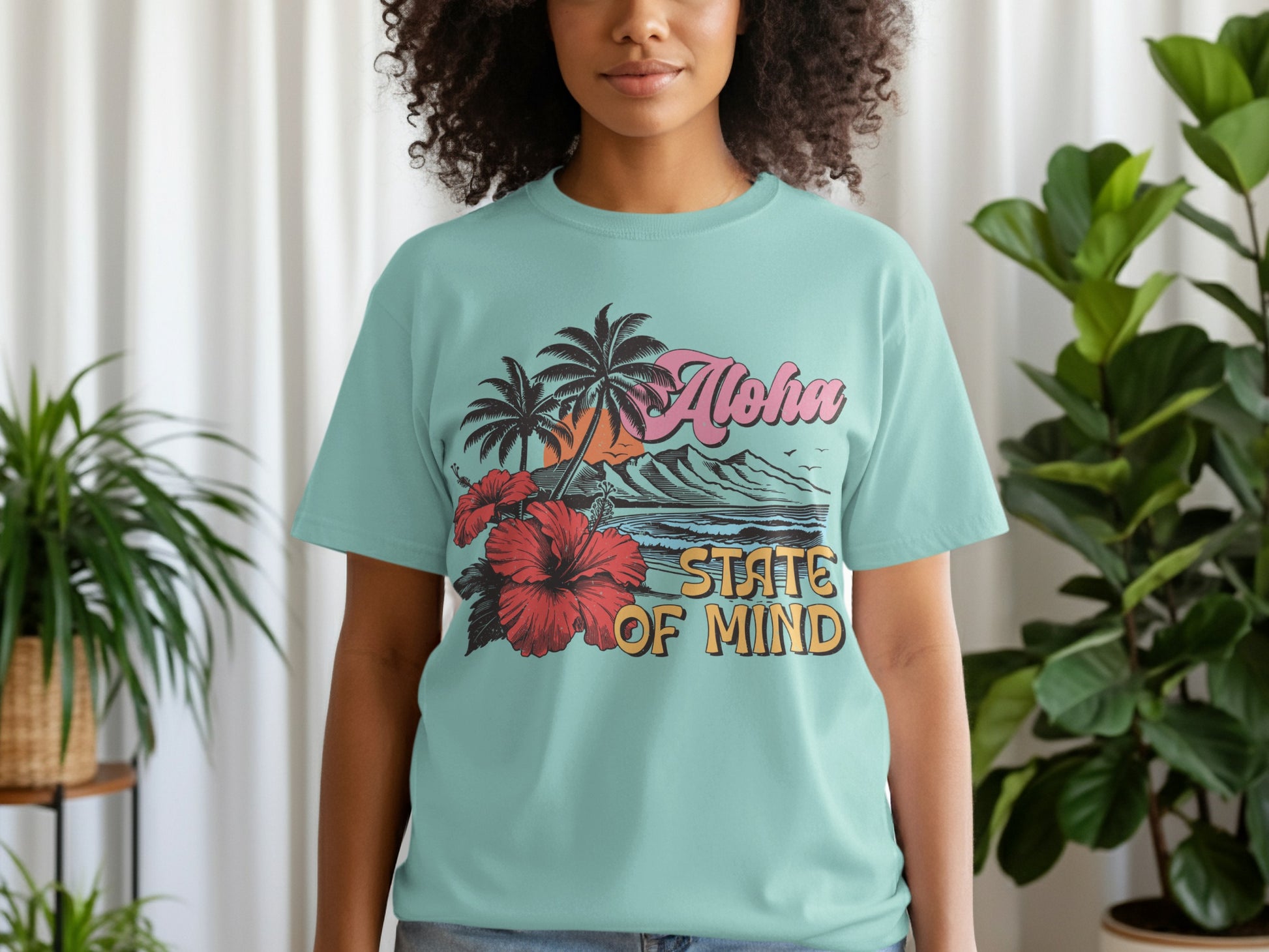 Light blue t-shirt with "Aloha State of Mind" and tropical hibiscus flowers.