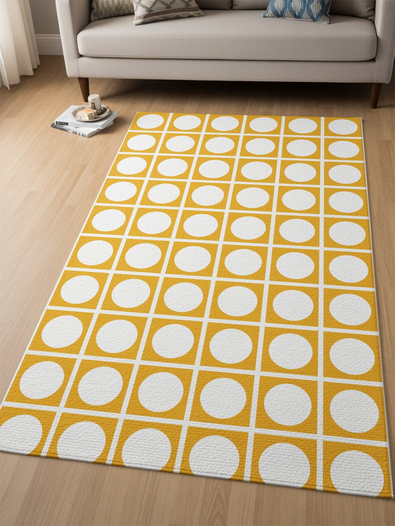 Yellow and white geometric rug with a grid of circles within squares.