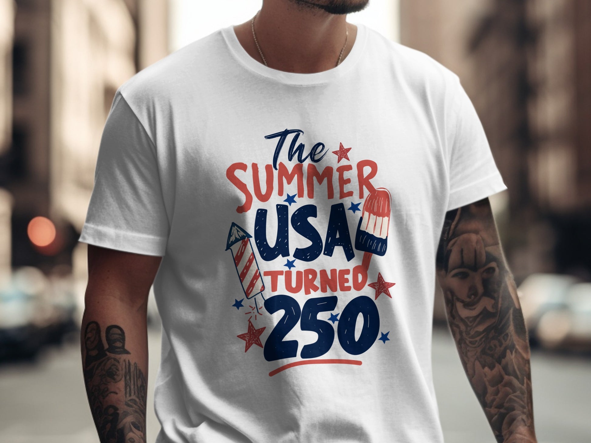 White t-shirt with "The Summer USA Turned 250" graphic and fireworks.