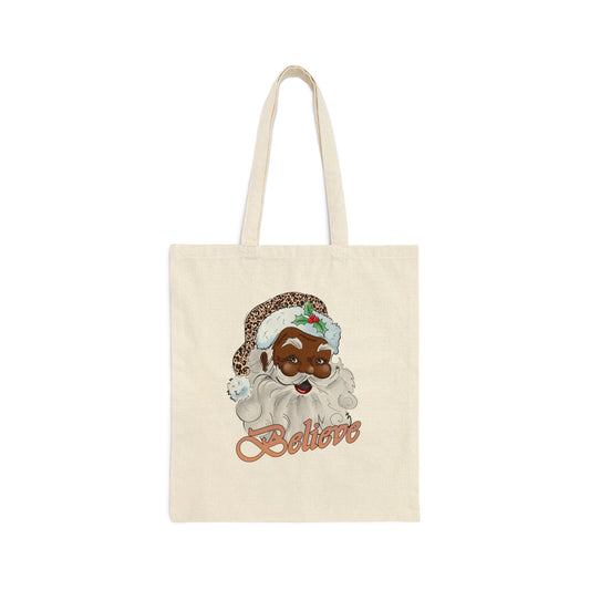 a tote bag with a black santa 